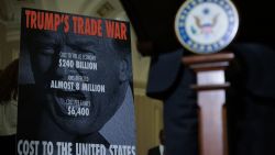 WASHINGTON, DC - APRIL 01: A sign on Trump's Trade War behind U.S. Tim Kaine (D-VA) while he speaks to reporters following the weekly Democratic Senate policy luncheon at the U.S. Capitol on April 01, 2025 in Washington, DC. Senators spoke about the White House's intended tariffs and taxes to be implemented.  (Photo by Kayla Bartkowski/Getty Images)