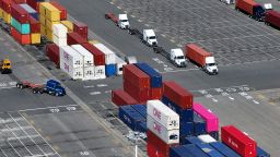 In an aerial view, shipping containers are stacked at the Port of Oakland on April 02, 2025 in Oakland, California.