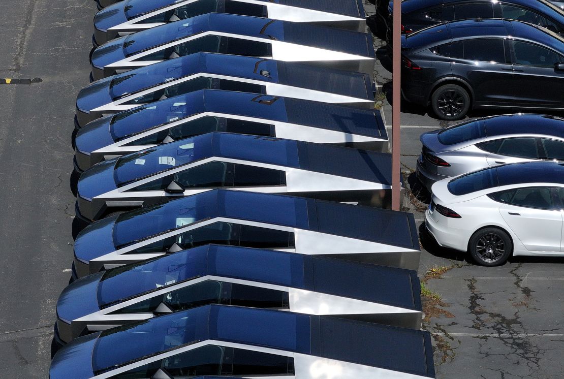 Brand new Tesla Cybertrucks are parked at a Tesla dealership on April 2 in Corte Madera, California.
