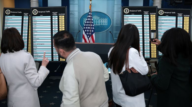 Charts that show America's “reciprocal tariffs” on display in the press briefing room at the White House on April 2 in Washington, DC.