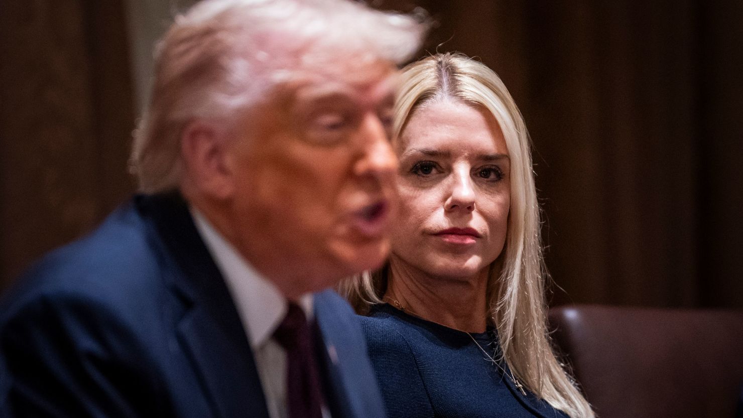 President Donald J. Trump, flanked by Attorney General Pam Bondi, speaks during a cabinet meeting at the White House on Monday, March 24, 2025 in Washington, DC.