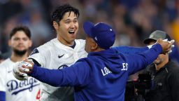 Shohei Ohtani celebrates after blasting a solo walk-off home run to give the Los Angeles Dodgers a 6-5 win over the Atlanta Braves.