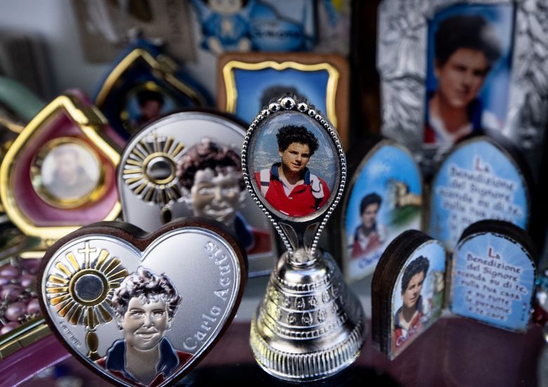 Pictures of Blessed Carlo Acutis are seen on souvenirs in a shop in Assisi on April 3.