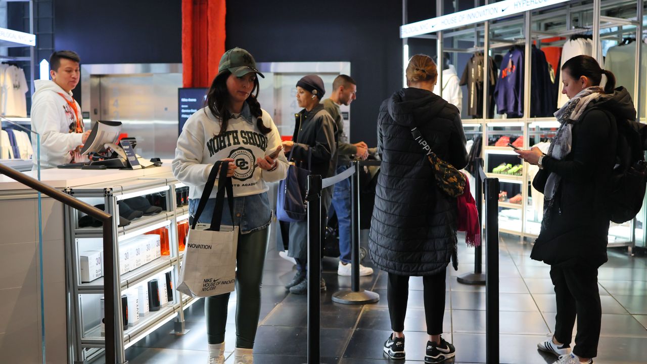 NEW YORK, NEW YORK - APRIL 03: People shop at a Nike store on Fifth Avenue on April 03, 2025 in New York City. U.S. President Donald Trump declared a U.S. economic emergency and announced sweeping tariffs of at least 10%, with rates even higher for 60 countries or those that have a high trade deficit with the U.S. The tariffs will affect electronics, automobiles, clothing and shoes, wines and spirits, and Swiss watches.   (Photo by Michael M. Santiago/Getty Images)