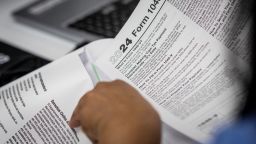 An immigrant receives help preparing her US income tax forms on March 29 in Connecticut.