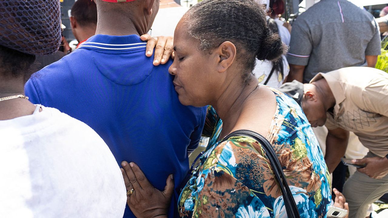 Relatives of victims wait outside the Jet Set nightclub after the collapse of its roof, in Santo Domingo, on April 8, 2025. Rescuers raced to find survivors Tuesday among the rubble of a Dominican Republic night club where at least 44 people died and dozens were hurt in an early-morning roof collapse. (Photo by Erickson POLANCO / AFP) (Photo by ERICKSON POLANCO/AFP via Getty Images)          