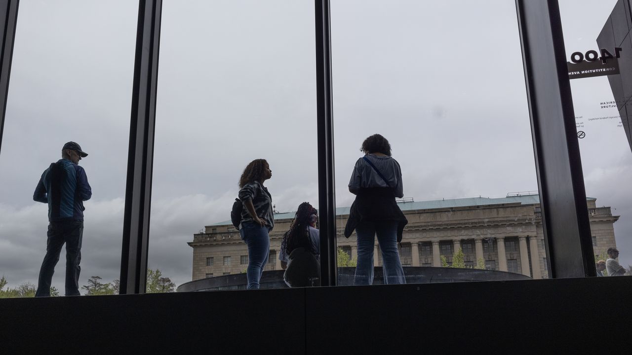 People wait to entet the Smithsonian National Museum of African American History and Culture, April 4, 2025, in Washington, D.C. President Trump has said he will be reviewing Smithsonian exhibits for bias against American values.
