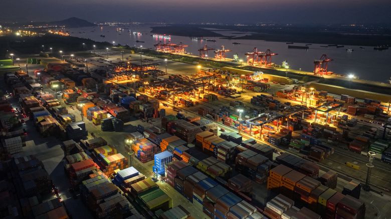 Shipping containers are seen at a port in Nanjing, in eastern China's Jiangsu province on April 8, 2025.