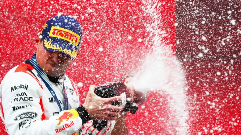 Max Verstappen produced an assured performance under pressure to win the Japanese Grand Prix.