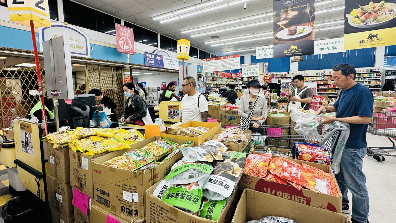 People shop at an Asian supermarket in Monterey Park, California on April 9, 2025. US President Donald Trump on APril 9, announced a 90-day pause on new tariffs for most countries except China, which he increased to 125% from 104% after China announced additional retaliatory tariffs. (Photo by Frederic J. BROWN / AFP) (Photo by FREDERIC J. BROWN/AFP via Getty Images)          