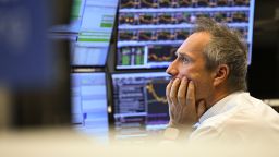 A trader watches his monitors on the floor of the Frankfurt Stock Exchange on April 10.