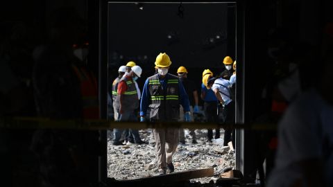 People work amid debris at the Jet Set nightclub -which roof collapsed two days ago- in Santo Domingo on April 10, 2025. The death toll in the collapse has reached 218, security forces reported, as they concentrate on finding the last bodies in the area of the tragedy. More than 500 people were injured in the incident. (Photo by MARTIN BERNETTI / AFP) (Photo by MARTIN BERNETTI/AFP via Getty Images)