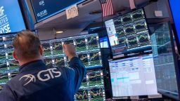 A trader works on the floor of the New York Stock Exchange.