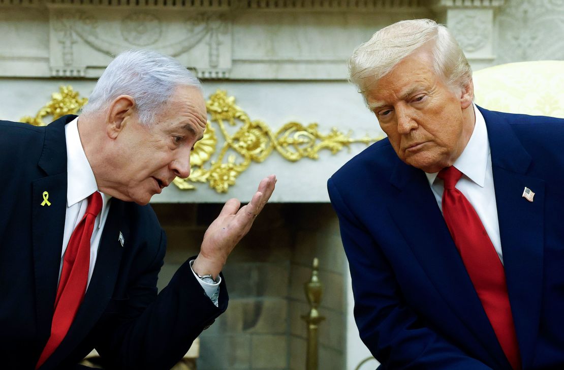 Israeli Prime Minister Benjamin Netanyahu, left, talks to US President Donald Trump during a meeting in the Oval Office on April 7.
