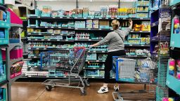 A woman shops at a Walmart in Rosemead, California, on April 11, 2025. Walmart, as a major retailer and a major importer of goods it sells to the American consumer, will be affected by the tariffs as estimates suggest some 70-80% of Walmart's products are sourced from China.