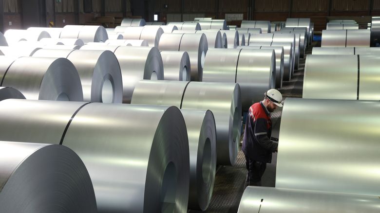 A worker registers coils of finished steel at the Thyssenkrupp steel plant.