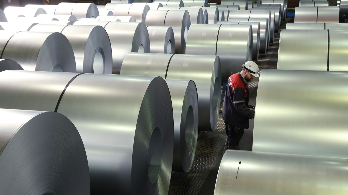 A worker registers coils of finished steel at the Thyssenkrupp steel plant.