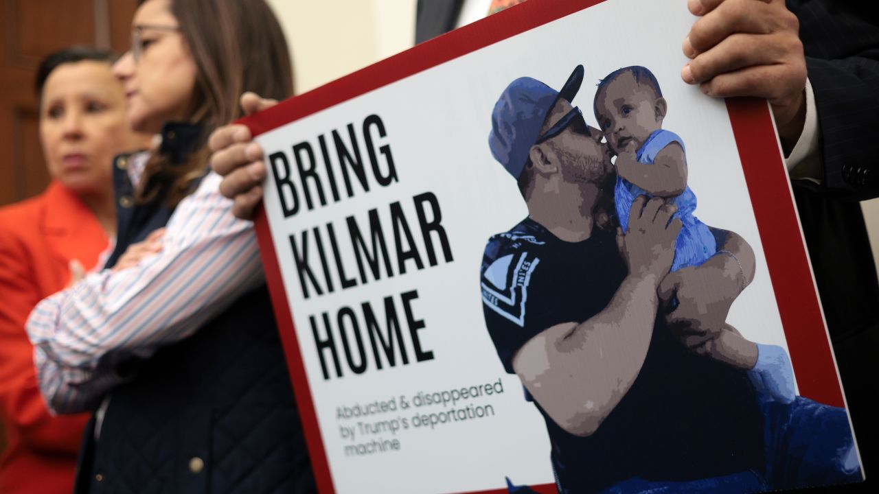 WASHINGTON, DC - APRIL 09: A member of the Congressional Hispanic Caucus holds a picture of Kilmar Abrego Garcia during a news conference to discuss Abrego Garcia's arrest and deportation d at Cannon House Office Building on April 9, 2025 in Washington, DC. The Congressional Hispanic Caucus held a news conference to discuss the deportation of Maryland resident Kilmar Abrego Garcia to the maximum security prison Terrorism Confinement Center (CECOT) in El Salvador, an incident the Trump administration claims as “an administrative error,” but refuses to bring Abrego Garcia back to the United States. (Photo by Alex Wong/Getty Images)