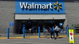 Customers enter a Walmart store on April 9, 2025, in San Leandro, California.