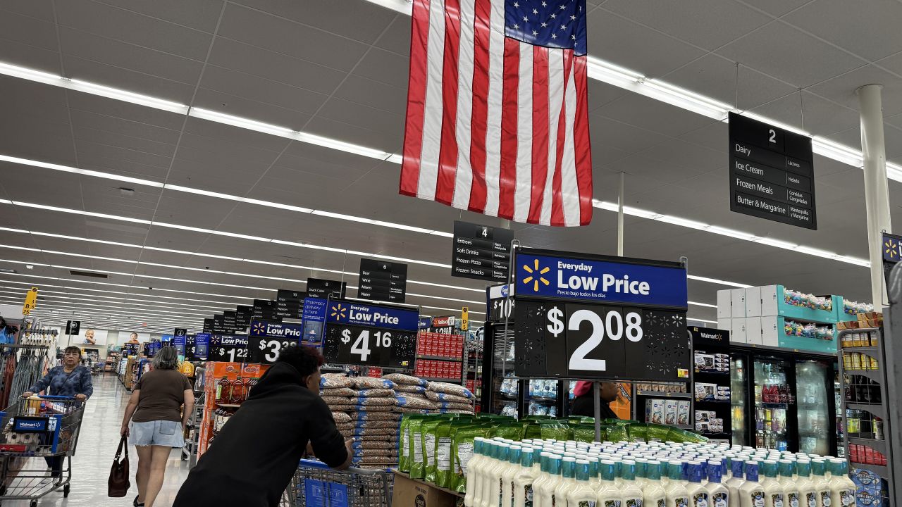 SAN LEANDRO, CALIFORNIA - APRIL 09: A customer shops at a Walmart store on April 09, 2025 in San Leandro, California. Walmart is pulling its first-quarter earnings estimates as President Donald Trump’s new tariffs could impact its profits in the first quarter. (Photo by Justin Sullivan/Getty Images)