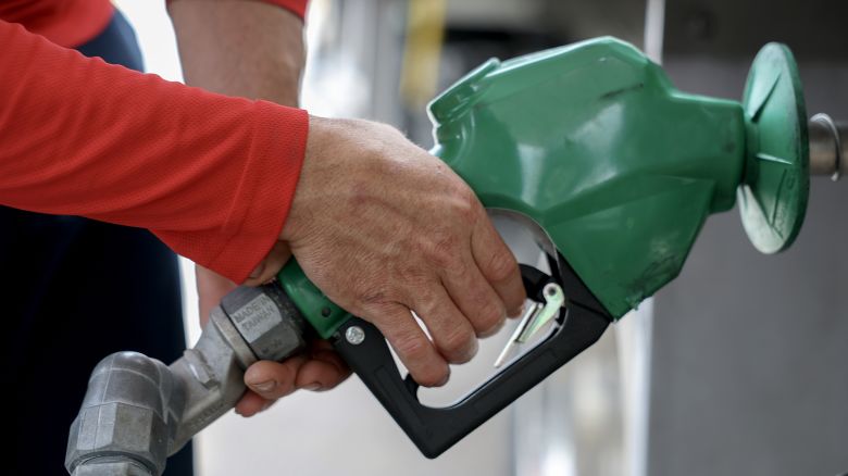 Arley Perez pumps diesel fuel into his truck at a Shell station on April 10, 2025 in Miami, Florida.
