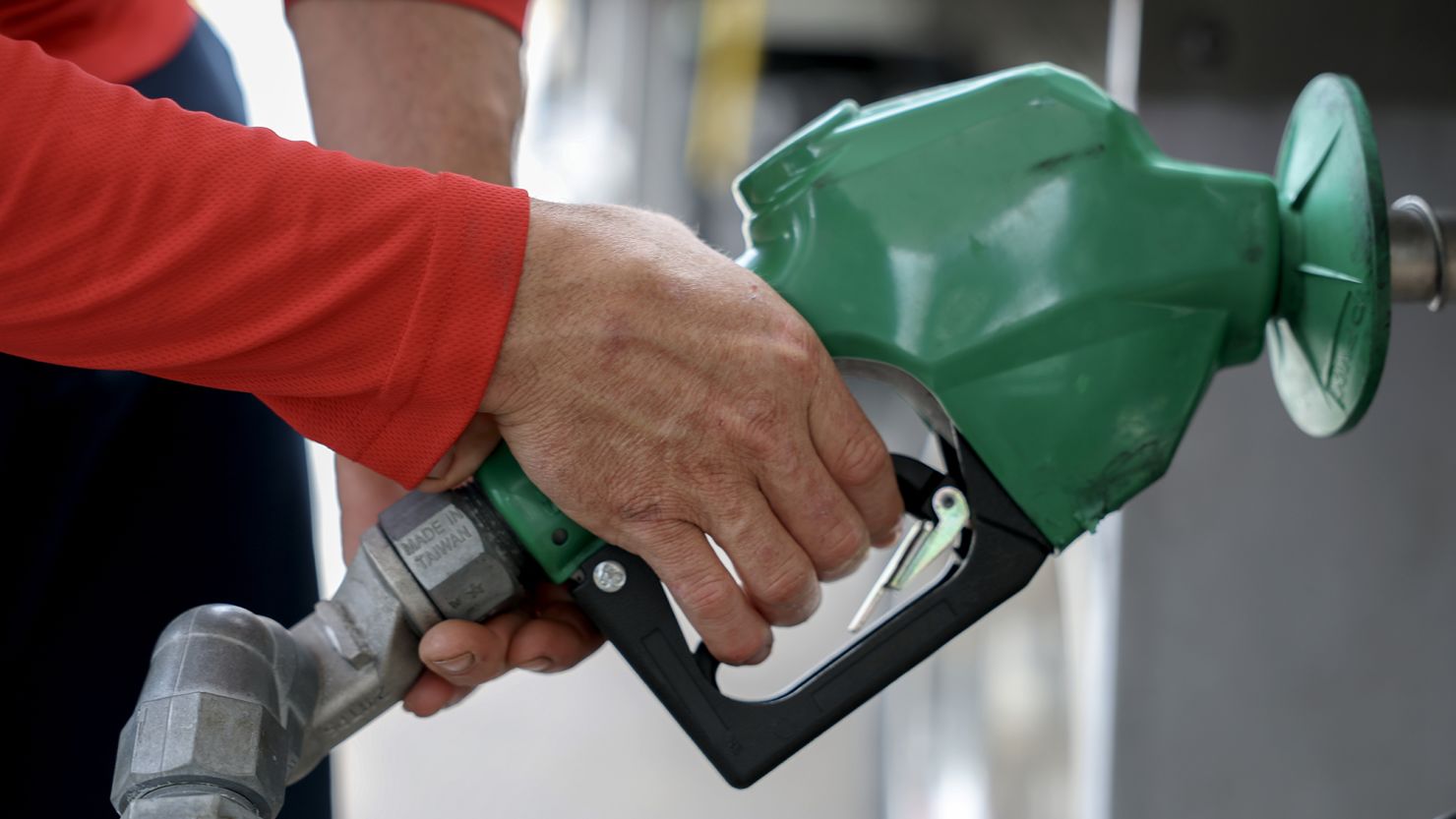 Arley Perez pumps diesel fuel into his truck at a Shell station on April 10, 2025 in Miami, Florida.