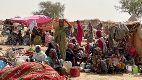 People who fled the Zamzam camp for the internally displaced after it fell under RSF control, rest in a makeshift encampment in an open field near the town of Tawila in war-torn Sudan's western Darfur region on April 13, 2025.
