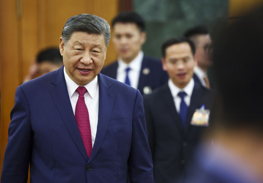 Chinese leader Xi Jinping arrives for a meeting with Vietnamese officials in Hanoi on April 14, 2025. Under Xi, China has often cracked down on independent activists and feminist campaigners.