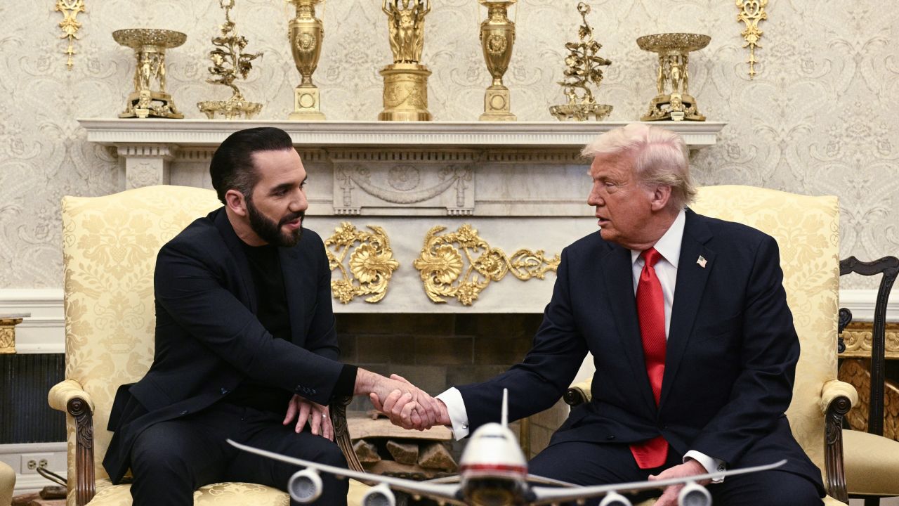 US President Donald Trump meets with El Salvador's President Nayib Bukele in the Oval Office of the White House in Washington, DC, April 14, 2025. Trump on Monday hosted El Salvador's President Nayib Bukele, the self-described "world's coolest dictator" who is now the US leader's key ally in a controversial push to deport illegal migrants to a notorious Salvadoran prison. The meeting comes as the White House faces pressure over the case of a father who was mistakenly deported to the jail in the Central American country -- whose return a US court has ordered the Trump stration to facilitate (Photo by Brendan SMIALOWSKI / AFP) (Photo by BRENDAN SMIALOWSKI/AFP via Getty Images)