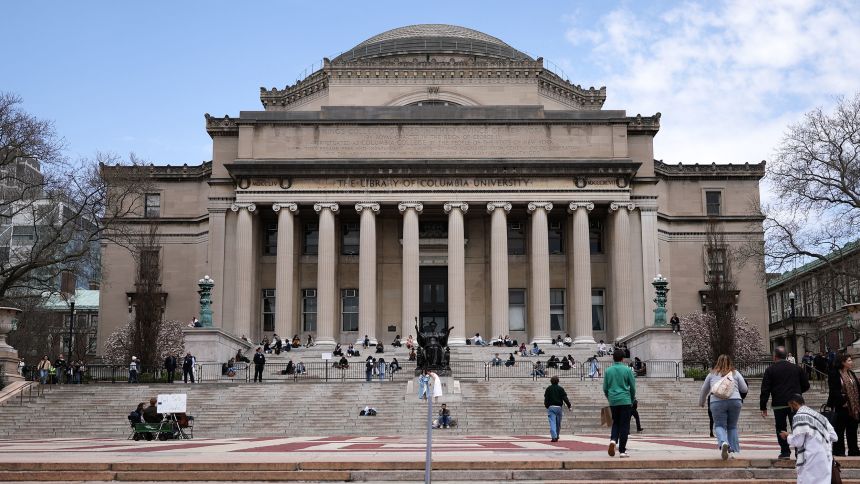 Students are seen April 14 on the campus of Columbia University in New York.