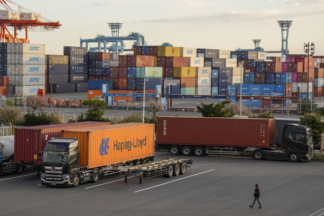 Trucks parked at a shipping terminal in Yokohama, Japan in April, 2025.