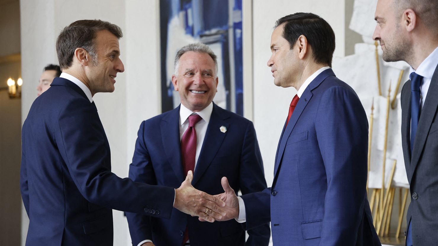 French President Emmanuel Macron welcomes US Secretary of State Marco Rubio and special envoy Steve Witkoff at the Elysee presidential palace in Paris on Thursday.