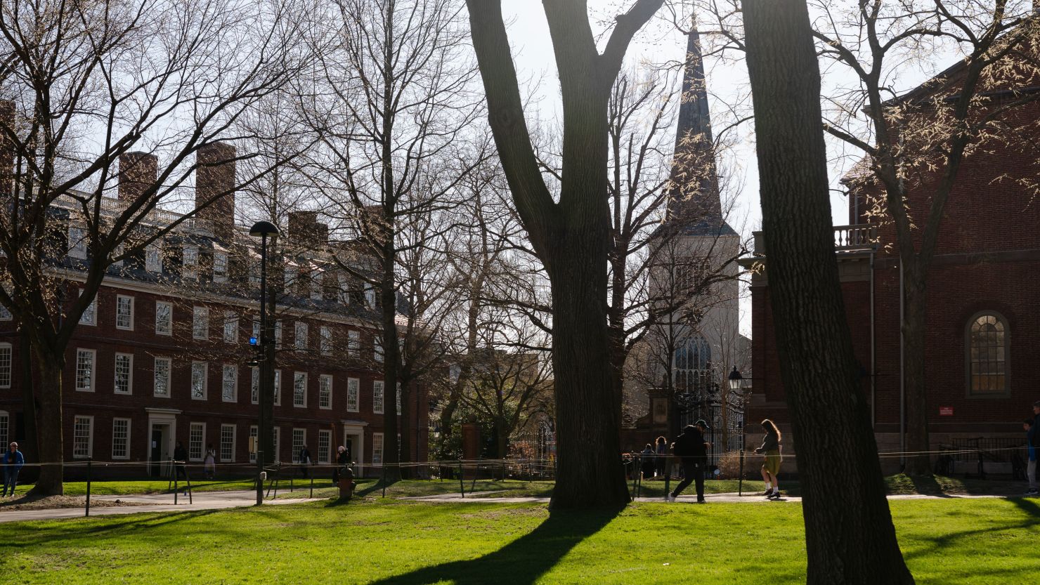 People walk through Harvard University's campus in Cambridge, Massachusetts, this month.