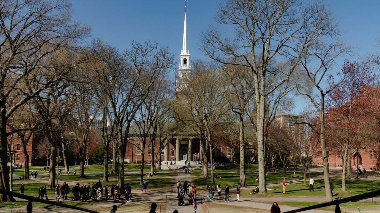 People cross Harvard Yard at Harvard University on Thursday in Cambridge, Massachusetts.