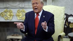 WASHINGTON, DC - APRIL 14: U.S. President Donald Trump gestures as he meets with President Nayib Bukele of El Salvador in the Oval Office of the White House April 14, 2025 in Washington, DC. Trump and Bukele were expected to discuss a range of bilateral issues including the detention of Kilmar Armando Abrego Garcia, who has been held in a prison in El Salvador since March 15.  (Photo by Win McNamee/Getty Images)
