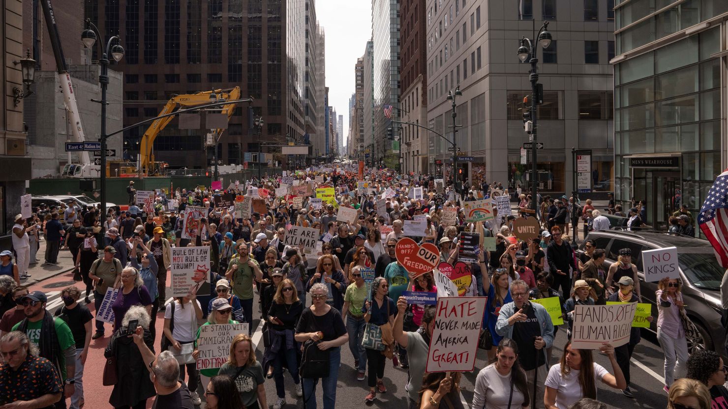 People take part in a protest organized to 'Protect Migrants, Protect the Planet' on April 19, 2025, in New York City.