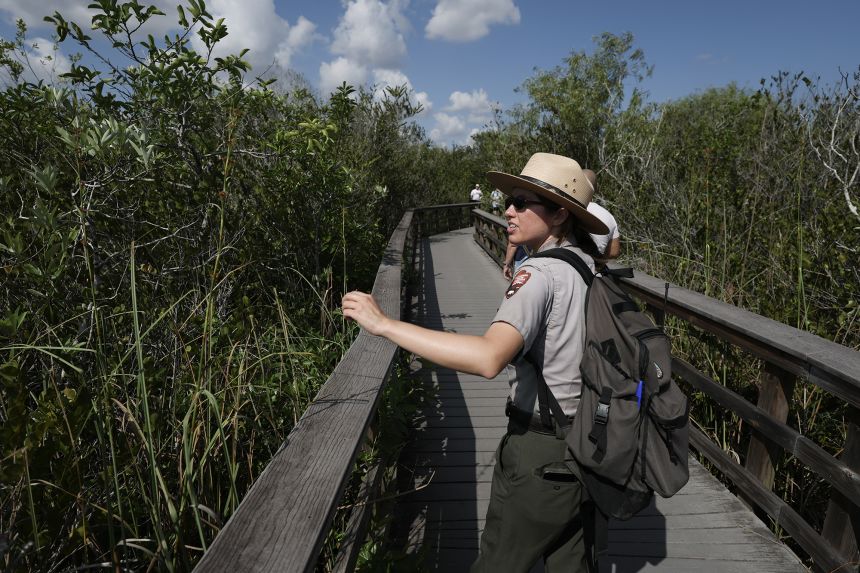A National Park Service Ranger conducts a walking tour in Shark Valley, part of the Everglades National Park, on April 17, 2025 in Florida.