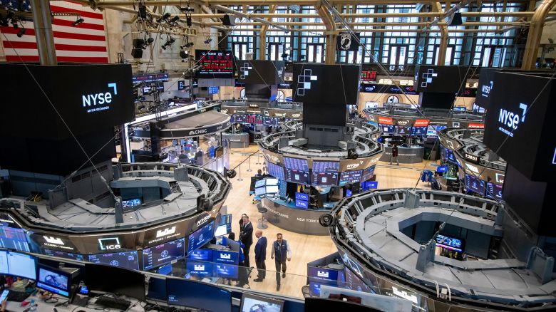 Traders work on the floor of the New York Stock Exchange on April 21. The S&P 500 is down 7.8% since President Donald Trump took office in January.