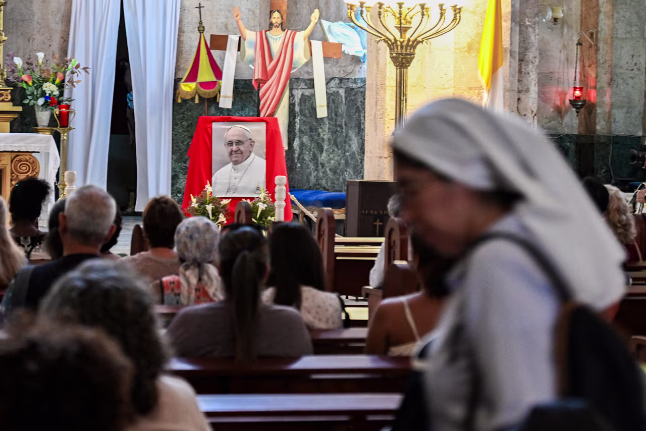 Cubans attend a mass in honor of late Pope Francis in Havana, Cuba, on Monday.