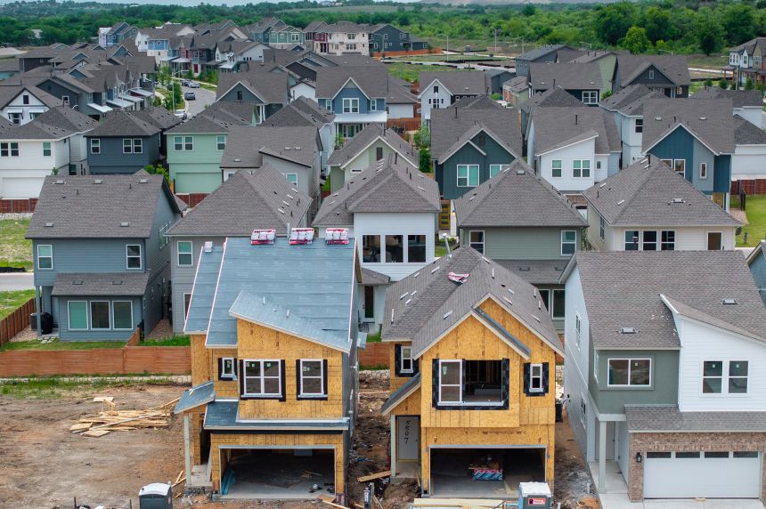 Houses undergo construction in a neighborhood in Austin, Texas, in April. Trump has ordered the Commerce Department to begin work on a new census.