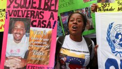 A relative of a Venezuelan migrant deported from the US to a mega-prison in El Salvador holds a sign during a protest to demand his freedom in Caracas on April 22, 2025. Relatives of migrants deported from the US to a mega-prison in El Salvador rejected on April 22, 2025, the prisoner exchange proposal made by Salvador's President Nayib Bukele to the Venezuelan government. (Photo by Pedro MATTEY / AFP) (Photo by PEDRO MATTEY/AFP via Getty Images)          