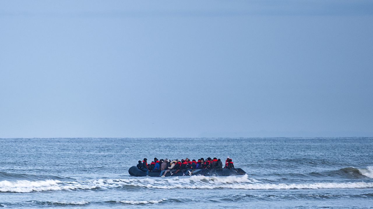 A refugee boat sets off to cross the English Channel from Wimereux, France, in April.