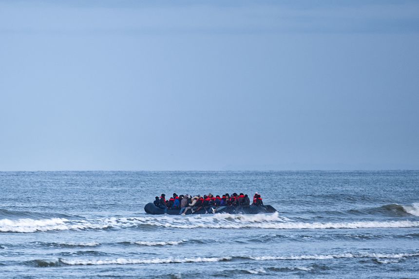 A refugee boat sets off to cross the English Channel from Wimereux, France, in April.