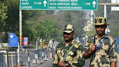 Indian Border Security Force (BSF) soldiers stand guard at the entrance of the India-Pakistan Wagah border post, about 35kms from Amritsar on April 24, 2025. India took a raft of punitive diplomatic measures against Pakistan on April 23, accusing Islamabad of ing "cross-border terrorism" after a deadly attack on civilians in Kashmir. (Photo by Narinder NANU / AFP) (Photo by NARINDER NANU/AFP via Getty Images)