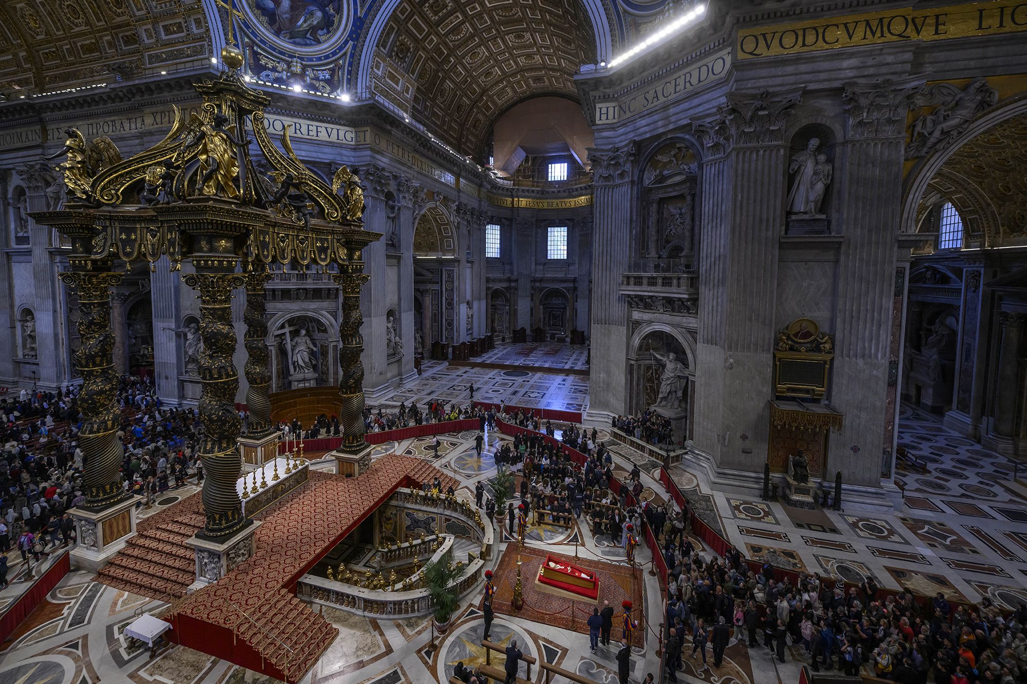 People pay their respects as the body of Pope Francis lies in state inside St. Peter's Basilica on Thursday, April 24. <a href="https://www.cnn.com/2025/04/23/europe/transfer-procession-pope-francis-coffin-intl-hnk/index.html">Francis was lying in state at the Basilica</a> for three days.