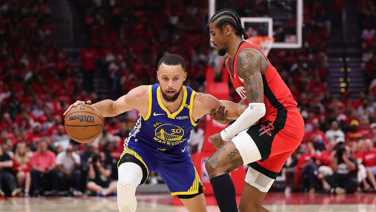 Stephen Curry #30 of the Golden State Warriors is defended by Jalen Green #4 of the Houston Rockets during the third quarter in Game One of the Western Conference First Round NBA Playoffs at Toyota Center on April 20, 2025 in Houston, Texas. NOTE TO USER: User expressly acknowledges and agrees that, by downloading and or using this photograph, User is consenting to the terms and conditions of the Getty Images License Agreement. (Photo by Alex Slitz/Getty Images)