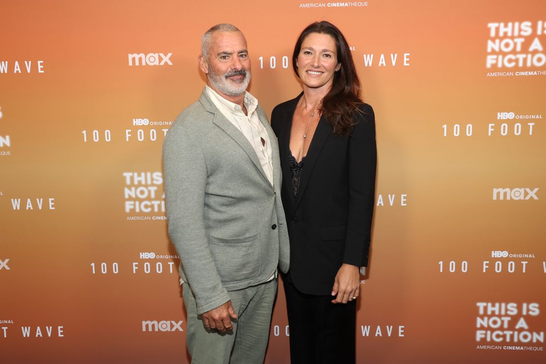 "100 Foot Wave," which centers around the lives of big wave surfers including McNamara and his wife Nicole, pictured, is entering its third season.