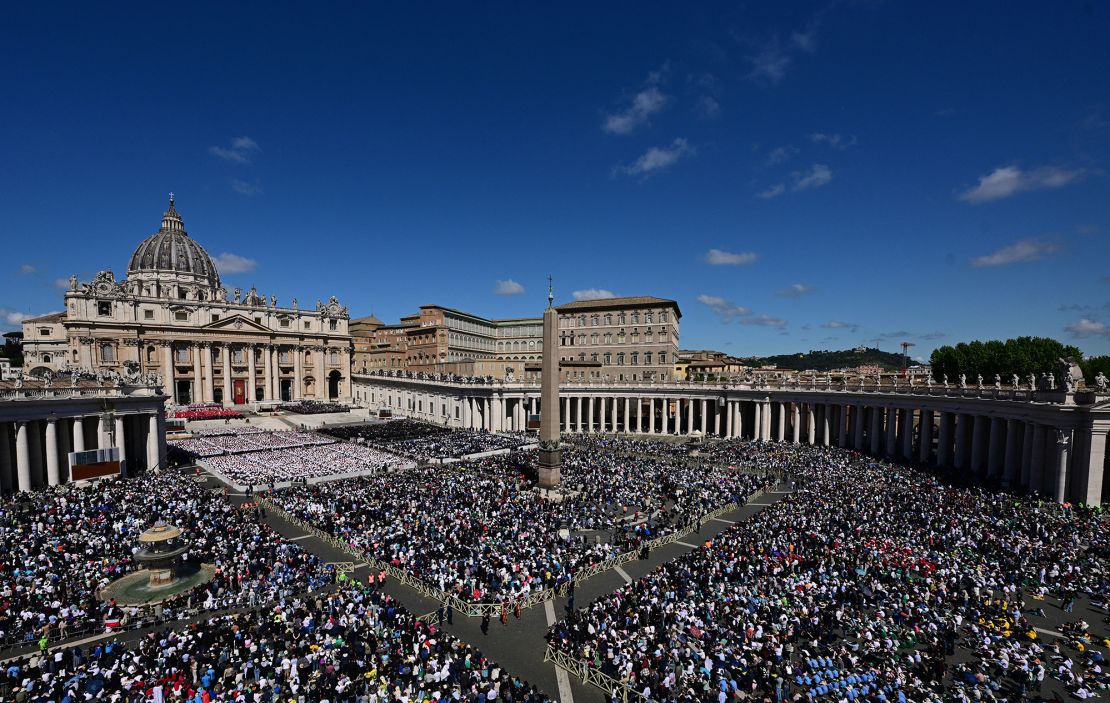 Faithful attend Pope Francis' funeral ceremony at St Peter's Square in the Vatican on April 26, 2025.