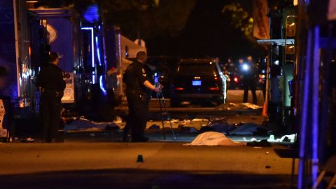 Vancouver police investigate a crime scene after a man drove into pedestrians at the annual Lapu Lapu festival celebrating Filipino culture, at East 43rd Avenue and Fraser, in the south of Vancouver on April 26, 2025. Canadian police arrested a man on April 26 after a car plowed into a street party in the western city of Vancouver killing a number of people. Authorities said the incident happened shortly after 8:00 pm (0300 GMT Sunday) in Vancouver's Sunset on Fraser neighborhood as  of the Filipino community gathered to celebrate Lapu Lapu Day. (Photo by Don MacKinnon / AFP) (Photo by DON MACKINNON/AFP via Getty Images)          