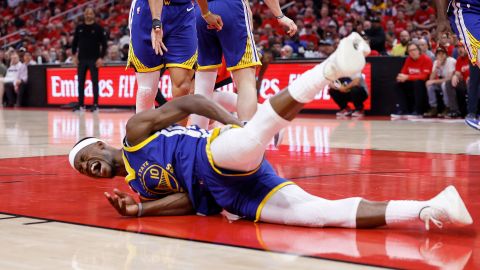 Jimmy Butler III of the Golden State Warriors goes to the floor after being fouled by Amen Thompson of the Houston Rockets in the first half in Game Two of the Western Conference First Round NBA Playoffs in Houston, Texas, at Toyota Center on April 23, 2025.